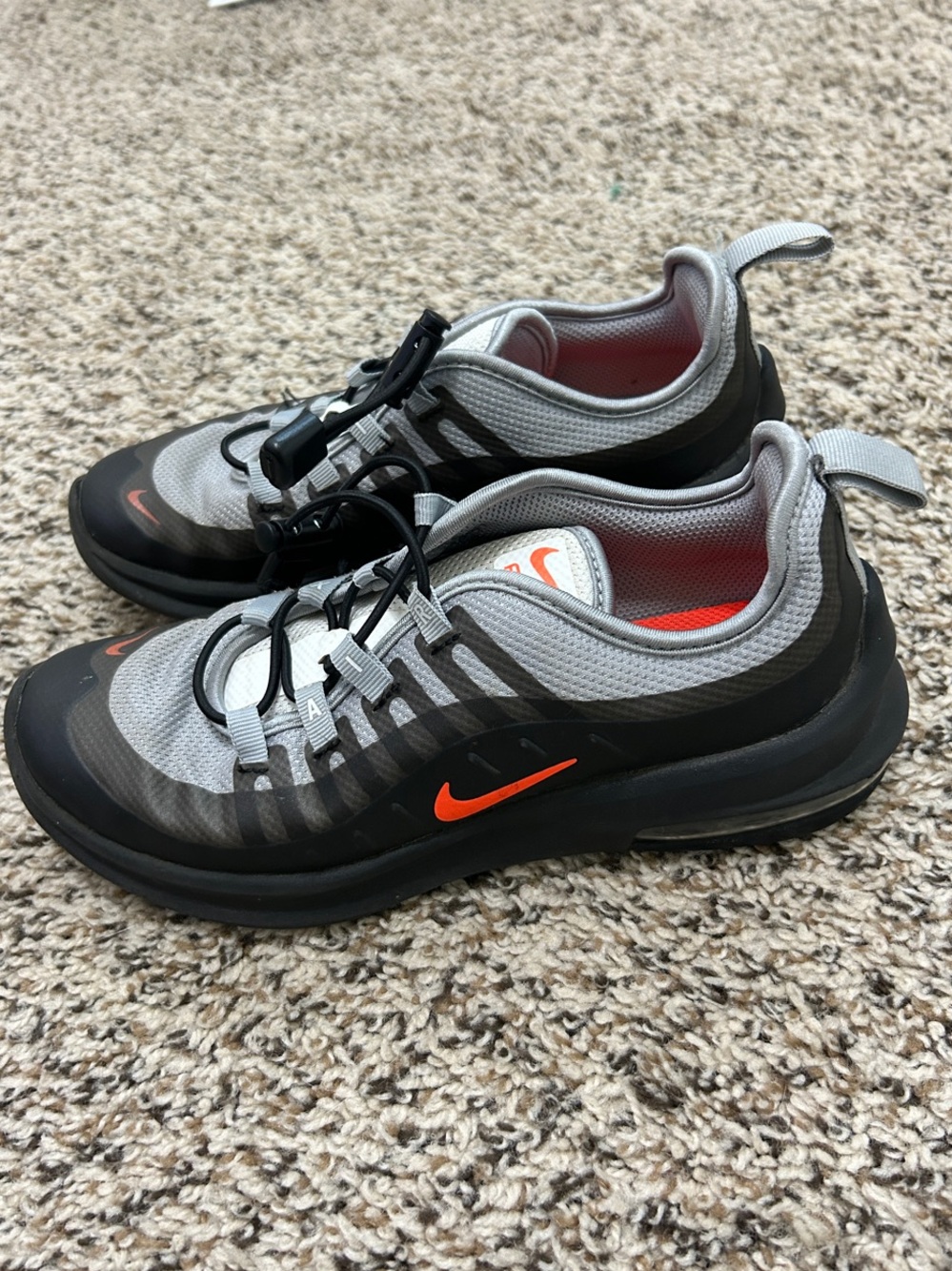 Nike Air Max Axis shoes in a Wolf Grey and Crimson